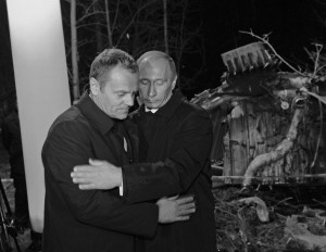 Russia's PM Putin comforts his Polish counterpart Tusk as they visit the site of a Polish government Tupolev Tu-154 aircraft crash near Smolensk airport